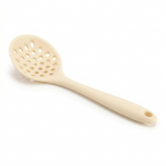 slotted spoon on a white background