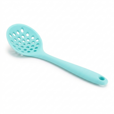 Light blue silicone spoon with holes on a white background